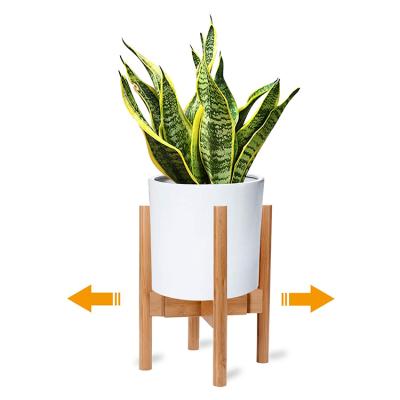 China Modern Indoor Natural Bamboo Flower Stand Plant Adjustable Display Stand for sale