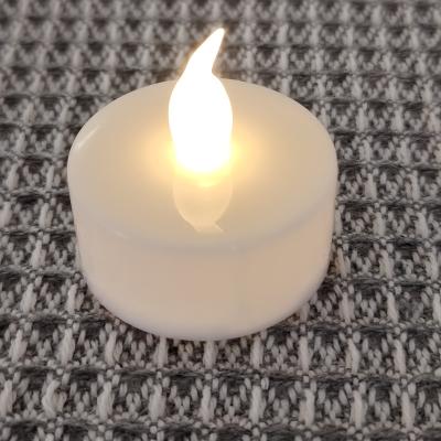 China Wholesale Warm Flameless Battery Operated Led Candle White Christmas Tea Light for sale