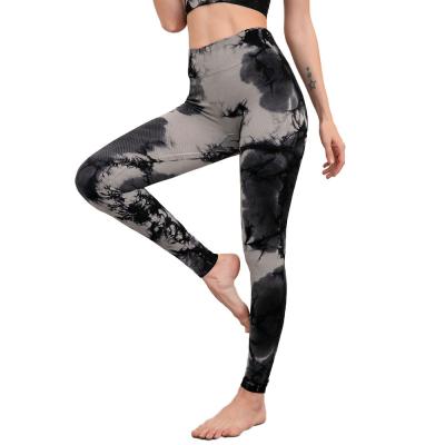 China Women's Breathable Gaiters Sport Pants Yoga Pants High Waist Seamless Knit Camouflage Gaiters Boot Cut Yoga Pants for sale