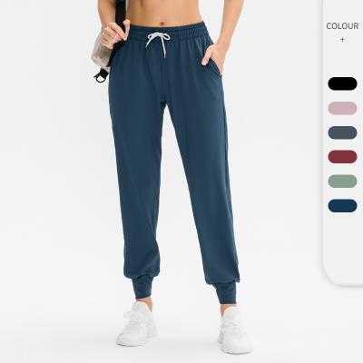 China QUICK DRY Women's Casual Workout Pants High Waisted Sports Pants Slim Breathable Fitness Drawstring Yoga Running Pants for sale