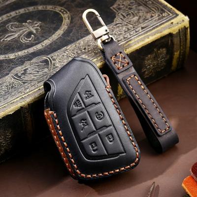 China Handcraft The Key Cover Handmade FOB Metal Cowhide Car Key Chain Protector Case For Cadillac for sale