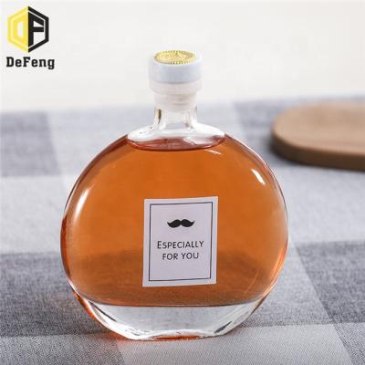 China New Beverage Flat Round Empty Bottle 250ml 500ml Ice Wine Glass Bottle Beverage Glass Bottle Red Wine for sale