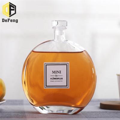 China New Flat Round 250ml 500ml Beverage Empty Ice Wine Glass Bottle Beverage Glass Bottle Empty Red Wine Bottle for sale