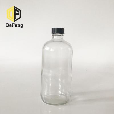 China Beverage 10ml - 1000ml Round Boston Clear Glass With Screw Cap for sale