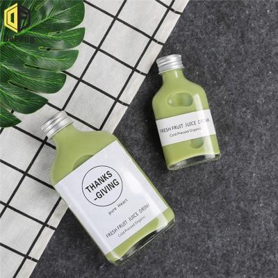 China Glass Cold Bottle 100ml Wine Extract Milk Tea Drink Bottle Yogurt Bottle Flat Coffee Bottle for sale