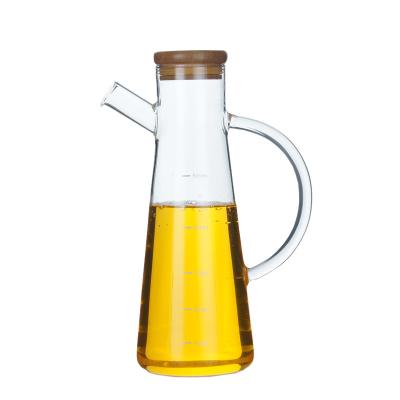 China Factory Direct Supply Viable Glass Oil Bottle With Cover And Side Leak Prevention for sale