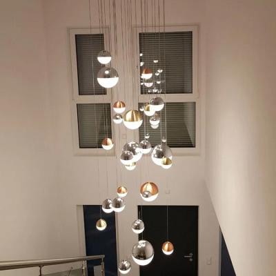 China Modern Nordic Duplex Building Acrylic Staircase Crystal Sand Lobby LED Ball Pendant Lamp Chandelier for sale