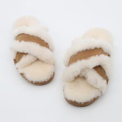 China Cushioning Cross Open Band Winter Soft Toe Furry Sheepskin Suede Leather Fur Slides For Women for sale