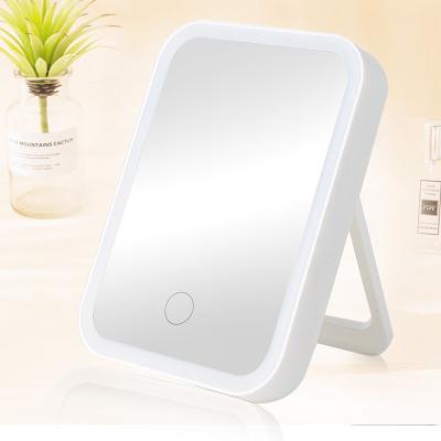 China Lighted Shape Mirror LED Beauty Light Makeup Mirror Portable Folding Hand Mirror for sale