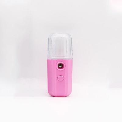 China Smart Mini Handheld Spray Bottle 30ml Electric Auto Spray Mini Moisturizing Skin Nano Facial Moisturizer for sale