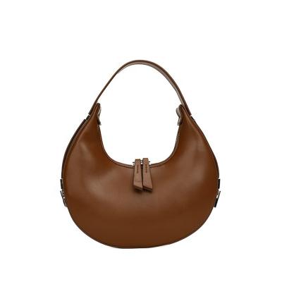 China Luxury Haoen New Arrival Bolsos Wommen'S Shoulder Bag Round Unique Mini Purse Custom Logo Handbag For Women for sale