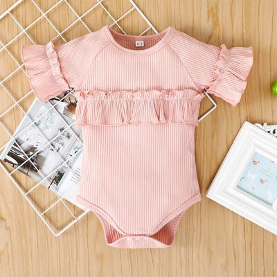 China 2021 newborn baby clothes solid color lotus leaf lace rompers 95% cotton baby clothes summer wholesale babies for sale