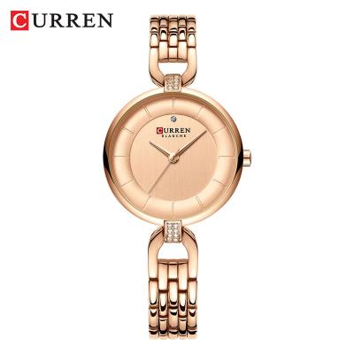 China Charming ladies date CURREN 9052 fashion quartz women rhinestone clock automatic luxury woman gift ladies stainless steel for sale