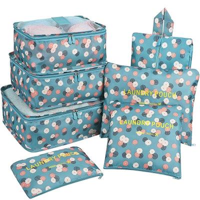 China Custom Folable 7pcs Travel Commodities Organizer Packing Cubes Lightweight Floral Large Size Floral Folable Luggage Bag for sale