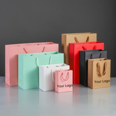 China Plain Paper Recyclable Cheap Colorful Printed Personal Wedding Kraft Paper Gift Bags With Customized Logo for sale