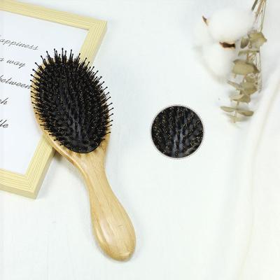 China Hot Selling Boar Bristle Bamboo Wooden Paddle Paddle Customized Logo Detangling Oval Wooden Hair Brush for sale