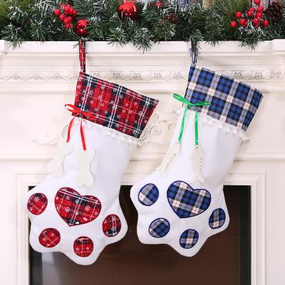 China Personalized Dog Paw Christmas Stocking Christmas Decorations Dog Pouches Gift Bag for sale