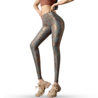 China Brilliant peach hip yoga pants sports yoga fitness crac! crack! viable funky gray snake print leggings women's butt for sale