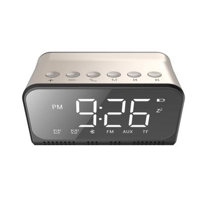 China Hot Selling Bluetooths Wireless Speaker Calendars Charger FM Alarm Digital Wall Clock with LED Screen Display for sale