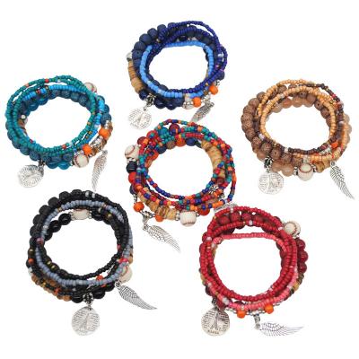 China BOHEMIA Women's Fashion Jewelry Colorful Ethnic Boho Stretch Multilayer Wood Beaded Bracelets Set for sale