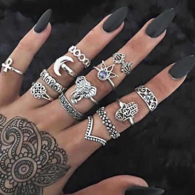 China TRENDY Women's Fashion Vintage Gold Silver Elephant Crown Palm Totem Ring Set 13pcs Carving Ring for sale