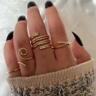 China TRENDY Women's Fashion Metal Ring Set 4pcs Double Spiral Metal Irregular Ring for sale