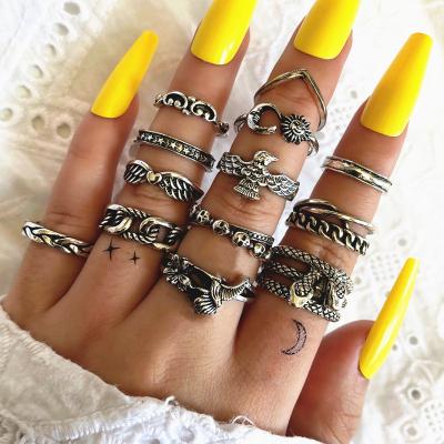 China TRENDY Women Shape Ring Eagle Snake Flower Cloud Star Moon Peach Heart Wings 13pcs Vintage Geometric Ring Set for sale