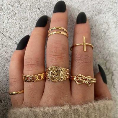 China FASHIONABLE punk dollar ring 18K gold women ring 8 chain figure knuckle cross ring 6 piece set for sale