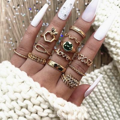 China TRENDY Women's Fashion Ring 12pcs Ring Set Gold Geometric Bee Frog Leaf Heart Knuckle Ring Set for sale