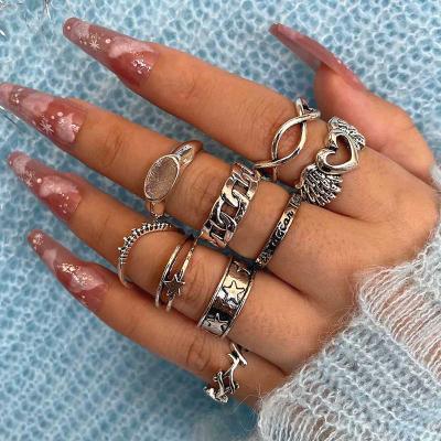 China FASHIONABLE Women Personalized Ring Set Angel Wings Love Star Chain 9pcs Knuckle Ring Five-pointed Punk Costume for sale