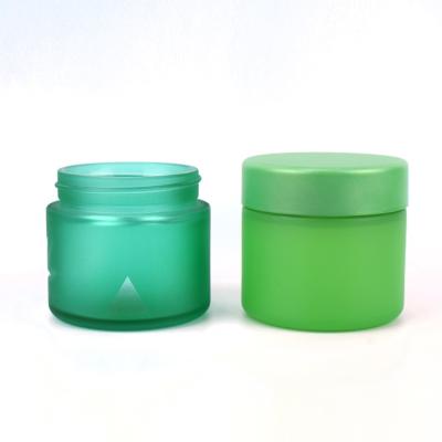 China Child Safe Designable Empty Straight Sided Cr 3Oz 2Oz 3.5G Natural Green Airtight Glass Jar With Child Resistant Lid for sale