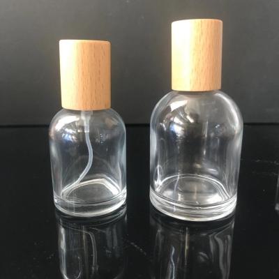 China LZ Personal Care Round Bottle Empty Clear Diffuser Cap 50ml Wooden Diffuser Bottle for sale