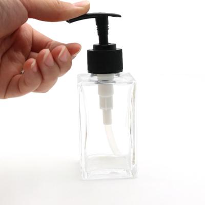 China Cosmetic high quality square shampoo bottles glass lotion bottle for cosmetic packaging for sale