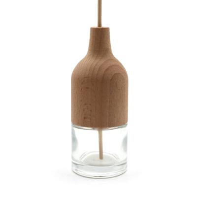 China Round Aromatherapy Glass Bottle 30ml Aroma Reed Diffuser Bottle With Dry Flower And Special Wooden Lid for sale