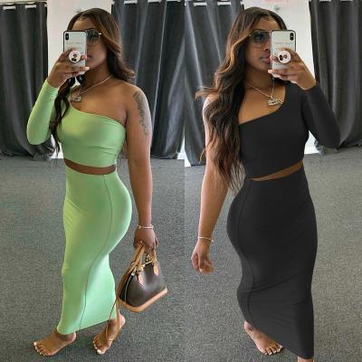 China 2021 Anti-Static New Style Skirt And Crop Top Fashion One Shoulder Women Two Piece Outfits for sale