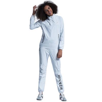 China New Polyester Winter Women's Sports Suit Shine Sweat Suit Running Sweat Suit for sale