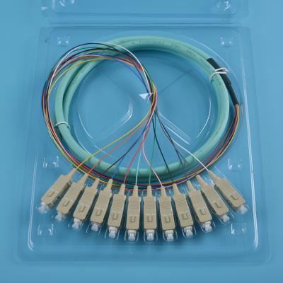 China FTTH hot sales 12 core fiber optic pigtails 50 sc 125 to UPC om3 12 color sc/upc fiber optic pigtail for sale