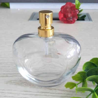 China Personal Care 85ml Perfume Glass Heart Shaped Bottle for sale