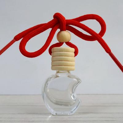 China Personal Care 5ml 8ml Square Car Diffuser Glass Bottle With Screw Wooden Cap Car Hanging Perfume Bottle Car Accessories Perfume Glass Bottle for sale