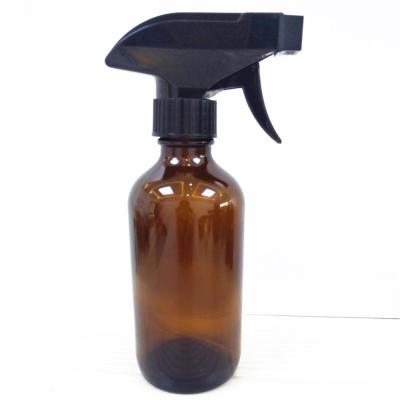 China Personal Care 250ml/500ml Amber Glass Boston Round Spray Refillable Bottles With Black Plastic Mist Sprayer for sale