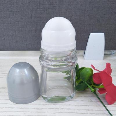 China Personal Care 50ML Roll-On Glass Bottle With Transparent Ball And Ball Seat for sale