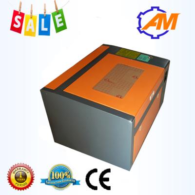 China AM6040 Mini And Desktop Co2 Laser Engraving Cutting Machine Engraver 40W for sale