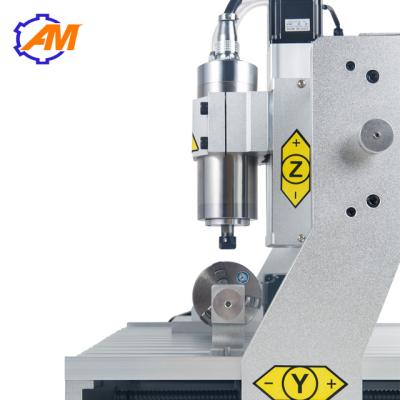 China Best selling mini metal cnc 3d carving machine 3040 4 axis  wood engraving carving cutting machine for sale for sale