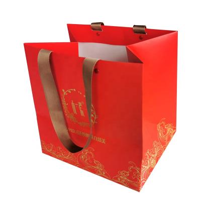 China Recycled Materials Zhishang Commodity Shop Custom Carrier Bags Packaging Foldable Reusable Bag Paper Bag Paper Shopping Bag With Logo for sale