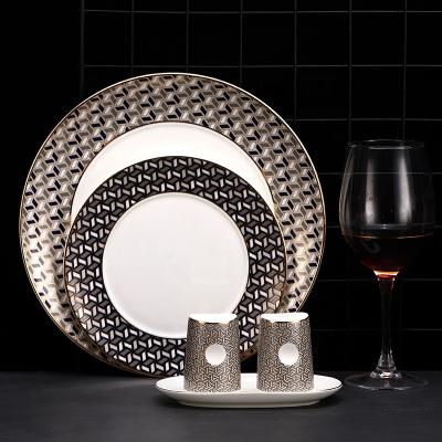 China Sustainable Nordic Unique Gold-Rimmed Ceramic Dessert Plate Dinnerware Dish Set Round Western Steak Dish for sale