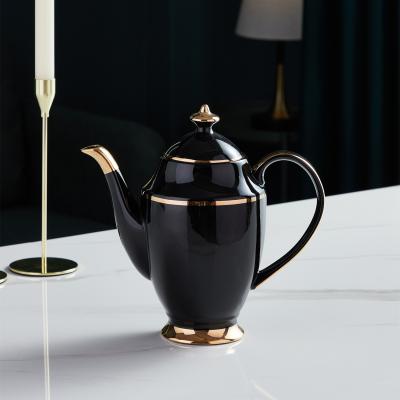 China Art Decor Banquet Used Gold Handle Rim Black Glazed Bone China Tea Set Luxury Teapot for sale