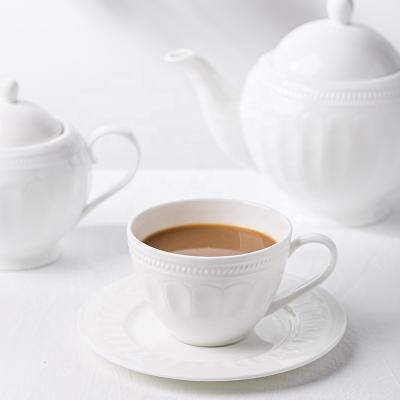 China Vintage Sustainable European Coffee Cup And Saucer Embossed Ceramic Tea Cup Set Milky White Tableware for sale