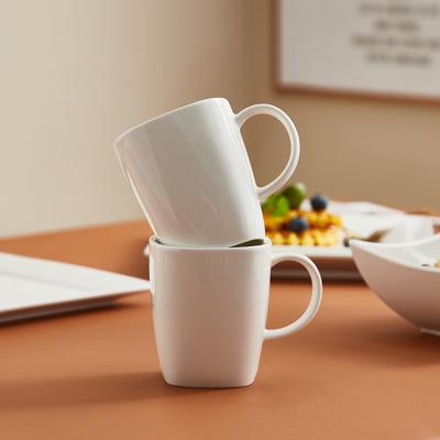 China Wholesale Custom High Temperature Sustainable 300CC Logo White Blank Bulk Coffee Milk Ceramic Mug With Handle for sale