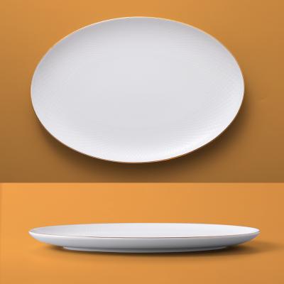 China Viable Rim Ceramic Plate Bone China High Quality Fish White Gold Tableware Wedding Banquet Dish Oval Serving Tray For Restaurant for sale