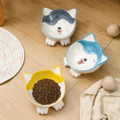 China New Arrival Non-automatic Porcelain Ceramic Pet Cat Dog Bowl Tilted Platform Cute Hand Painted Shaped Feeding Bowl for sale